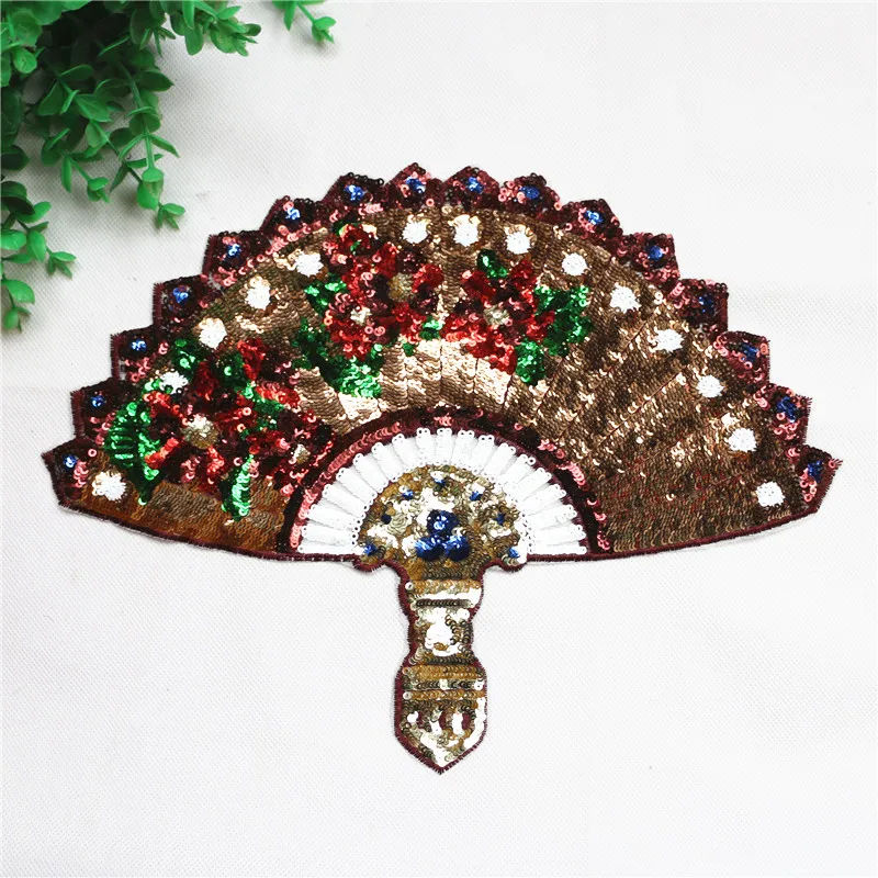 high quality Embroidered iron on Patch Quality Embroidery fan with sequins Applique for t-shirt or jacket
high quality Embroidered iron on Patch Quality Embroidery fan with sequins Applique for t-shirt or jacket