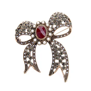 New European and American retro style fashion trend hollow imitation pearl semi-precious stone bow ladies brooch
New European and American retro style fashion trend hollow imitation pearl semi-precious stone bow ladies brooch