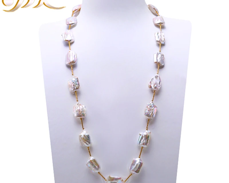 Фото Длинное жемчужное ожерелье белое из пресноводного жемчуга в стиле барокко