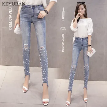 2020 Spring Autumn New Pearl Beaded Ripped Jeans Blue Mid Waist Pocket Skinny Women Casual Denim Pants Irregular Trousers L2140
2020 Spring Autumn New Pearl Beaded Ripped Jeans Blue Mid Waist Pocket Skinny Women Casual Denim Pants Irregular Trousers L2140
