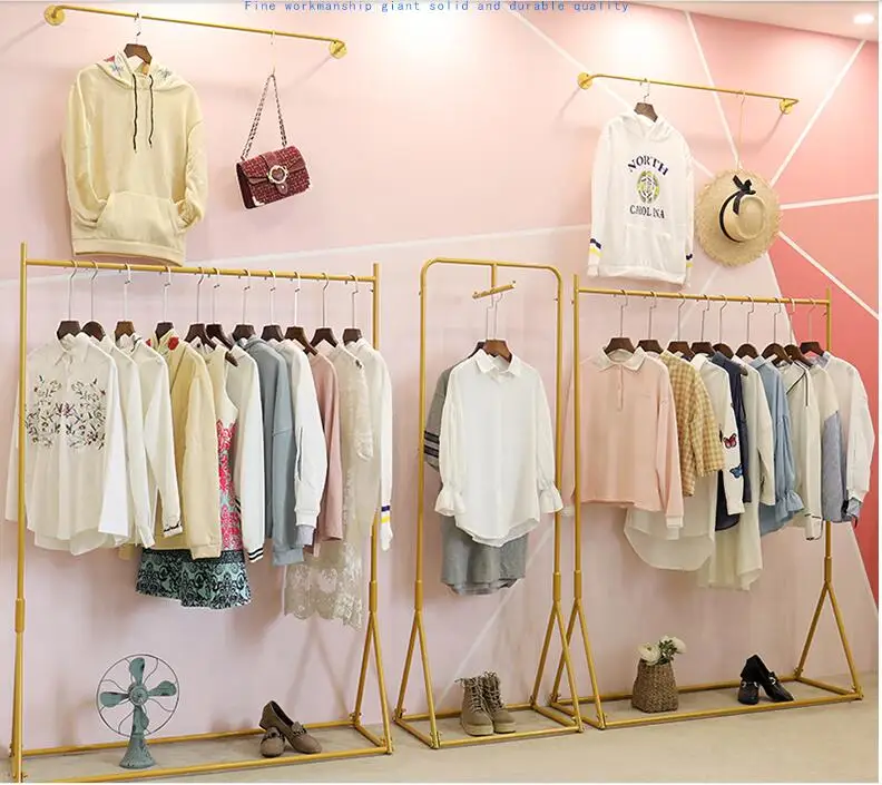 Golden Textile Gondola clothing store display creative combination hangers floor-to-floor side hanging iron hangers.
Golden Textile Gondola clothing store display creative combination hangers floor-to-floor side hanging iron hangers.