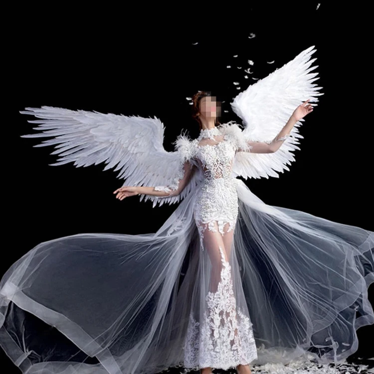 Costumed beautiful white angel feather wings for wedding Photography Display Party wedding decoration Cosplay fashion show props
Costumed beautiful white angel feather wings for wedding Photography Display Party wedding decoration Cosplay fashion show props