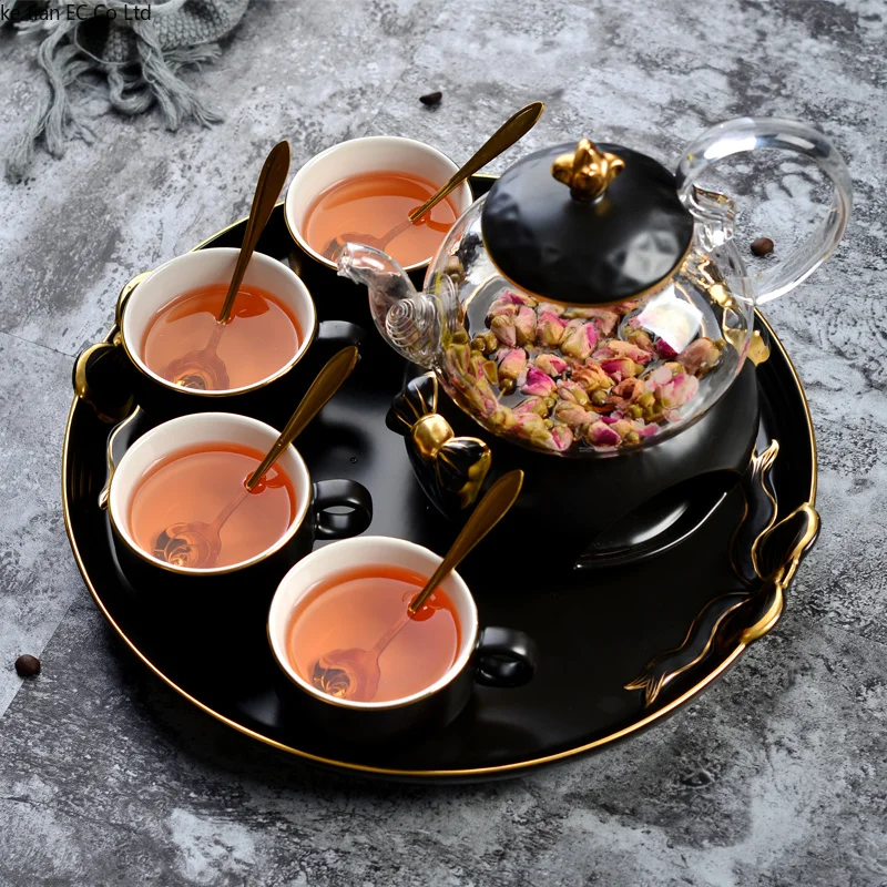 Nordic simple coffee cup set teapot set English afternoon tea gold ceramic heated glass flower teapot with tray candle
Nordic simple coffee cup set teapot set English afternoon tea gold ceramic heated glass flower teapot with tray candle