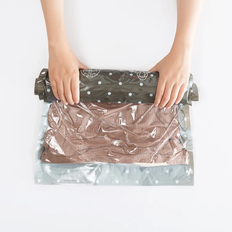 PA+PE Plastic Hand Roll Compression Bag Waterproof and can Reuse for Clothes Socks Shoes Quilt and Blankets
PA+PE Plastic Hand Roll Compression Bag Waterproof and can Reuse for Clothes Socks Shoes Quilt and Blankets