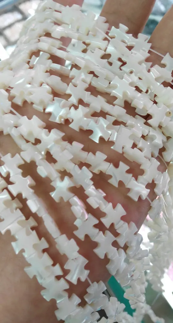 high quality 2strands 8charm8mm Genuine MOP Shell ,Pearl Shell cross ,cross shell white ewelry beads
high quality 2strands 8charm8mm Genuine MOP Shell ,Pearl Shell cross ,cross shell white ewelry beads