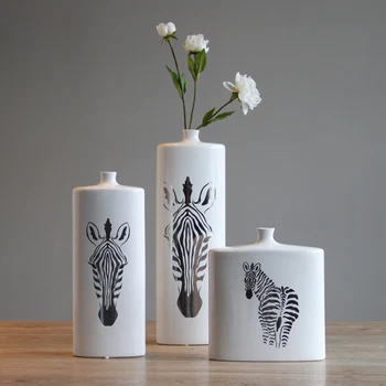 Very simple new classical white porcelain ink figure zebra ceramic vase Chinese Japanese modern style decoration art
Very simple new classical white porcelain ink figure zebra ceramic vase Chinese Japanese modern style decoration art