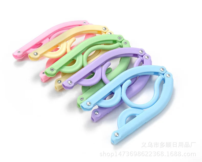 Travel folding hangers Portable magic drying plastic hangers Plastic non-slip hangers
Travel folding hangers Portable magic drying plastic hangers Plastic non-slip hangers