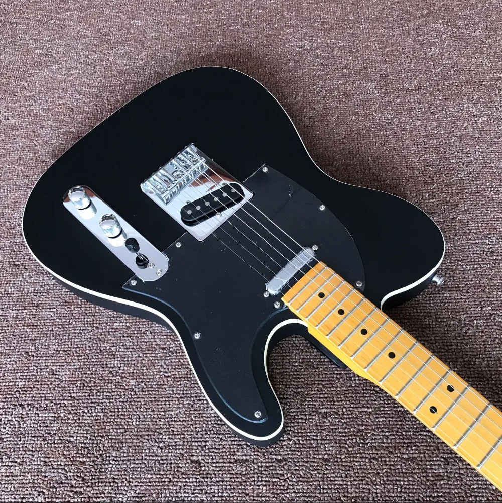 New arrive Chinese factory black beautiful top standard Electric Guitar Real photo shows
New arrive Chinese factory black beautiful top standard Electric Guitar Real photo shows