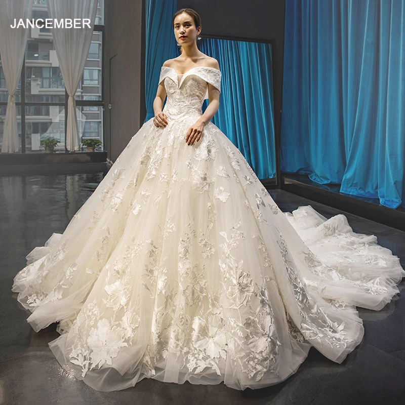 J66599 jancember wedding dress with train floor length off the shoulder lace up back ball gown bridal dress vestido de noiva 
J66599 jancember wedding dress with train floor length off the shoulder lace up back ball gown bridal dress vestido de noiva