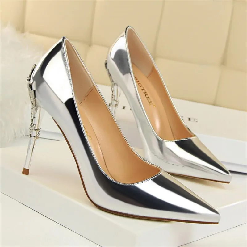Fashion sexy metal with women's shoes with stiletto high-heeled shallow mouth pointed patent leather was thin single shoes
Fashion sexy metal with women's shoes with stiletto high-heeled shallow mouth pointed patent leather was thin single shoes
