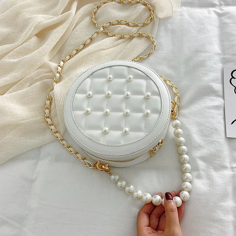 The new 2019 summer fashion trend pearl handbags rhombic chain small round bag wild messenger bag shoulder bag wallet bag
The new 2019 summer fashion trend pearl handbags rhombic chain small round bag wild messenger bag shoulder bag wallet bag