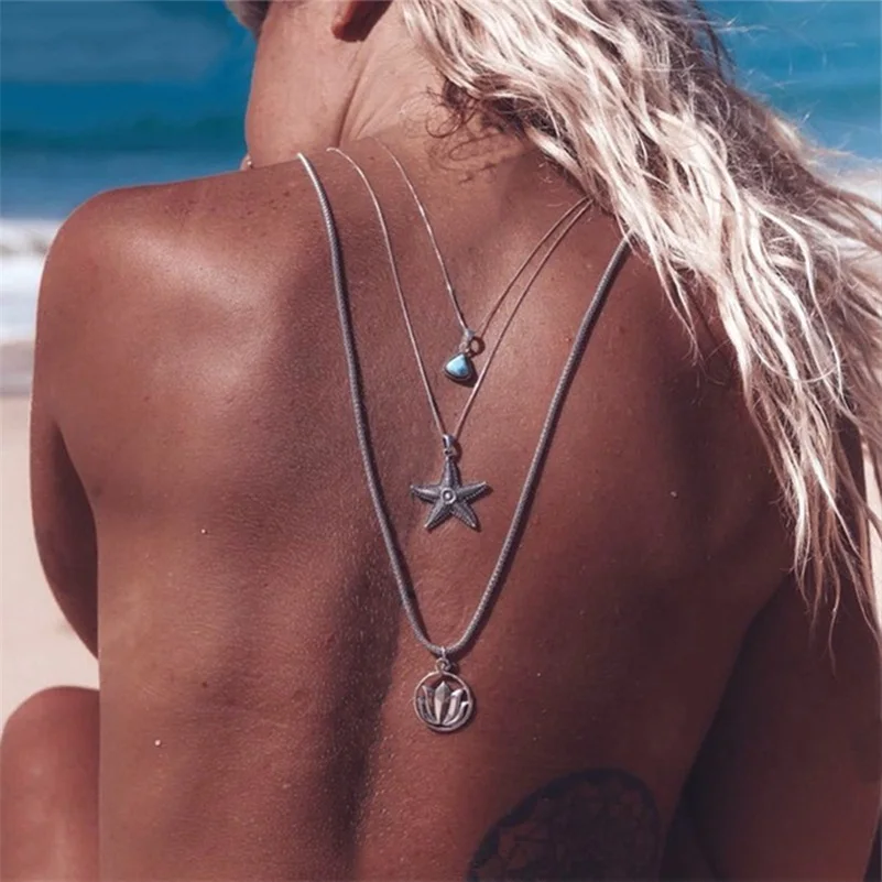 

Women's Simple Triangle Gems Pentagram Openwork Lotus Pendant Necklace Bohemian Fashion Beach Jewelry Accessories