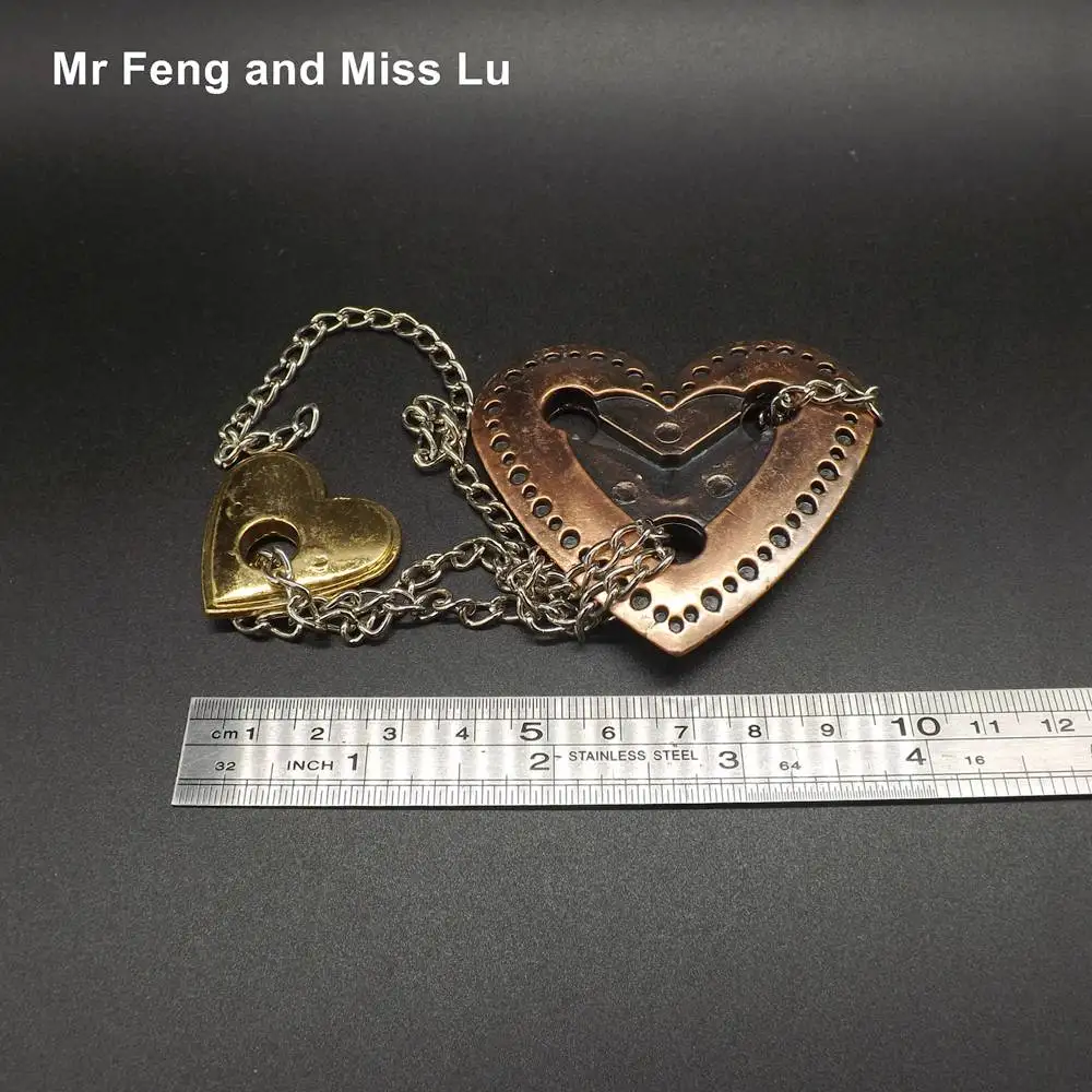 Mysterious Lock Heart Toy Cast Metal Puzzle Brain Teaser Game Adults Children Gifts
Mysterious Lock Heart Toy Cast Metal Puzzle Brain Teaser Game Adults Children Gifts