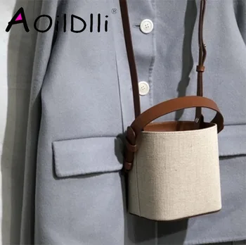 Korea Dongdaemun style Handmade custom stitching contrast color handbag shoulder bag handmade square bottom bucket bag
Korea Dongdaemun style Handmade custom stitching contrast color handbag shoulder bag handmade square bottom bucket bag