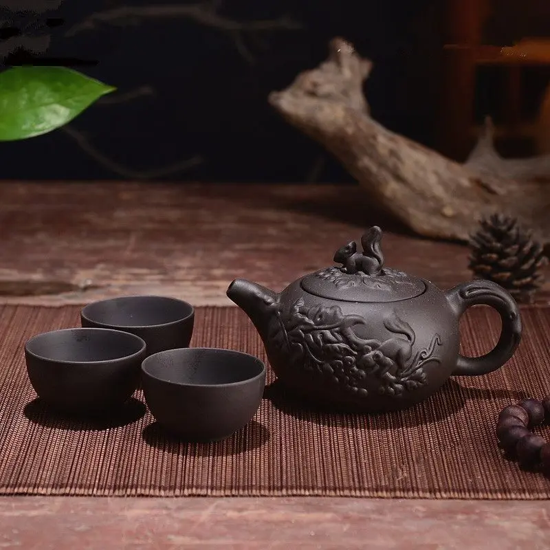 150ML Yixing Teapot Purple Clay Kung Fu Tea Set Handmade Dragon Elephant Squirrel Tea Pot With 3pcs Cup Set
150ML Yixing Teapot Purple Clay Kung Fu Tea Set Handmade Dragon Elephant Squirrel Tea Pot With 3pcs Cup Set