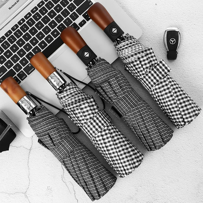Creative plaid pattern tri-fold automatic folding umbrella male business solid wood retro gentleman custom umbrella advertising
Creative plaid pattern tri-fold automatic folding umbrella male business solid wood retro gentleman custom umbrella advertising