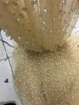 Nigerian french net Lace YG-21606 Embroidered Lace Fabric with full beads for bridal dress in gold color
Nigerian french net Lace YG-21606 Embroidered Lace Fabric with full beads for bridal dress in gold color