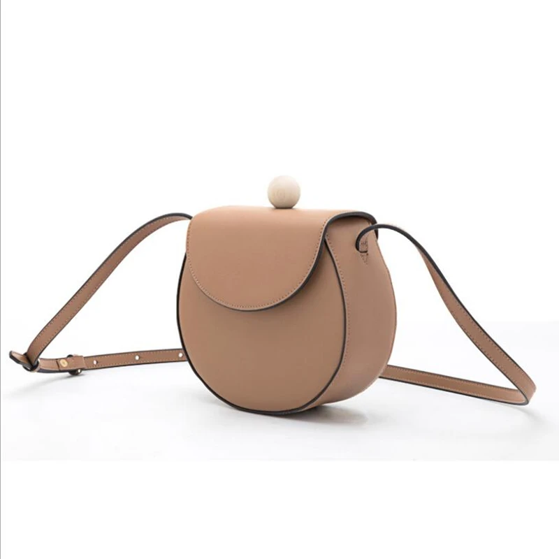 Fashion simplesmll round bag ladies designer handbag high quality leather leather large capacity single shoulder cross bag qq216
Fashion simplesmll round bag ladies designer handbag high quality leather leather large capacity single shoulder cross bag qq216