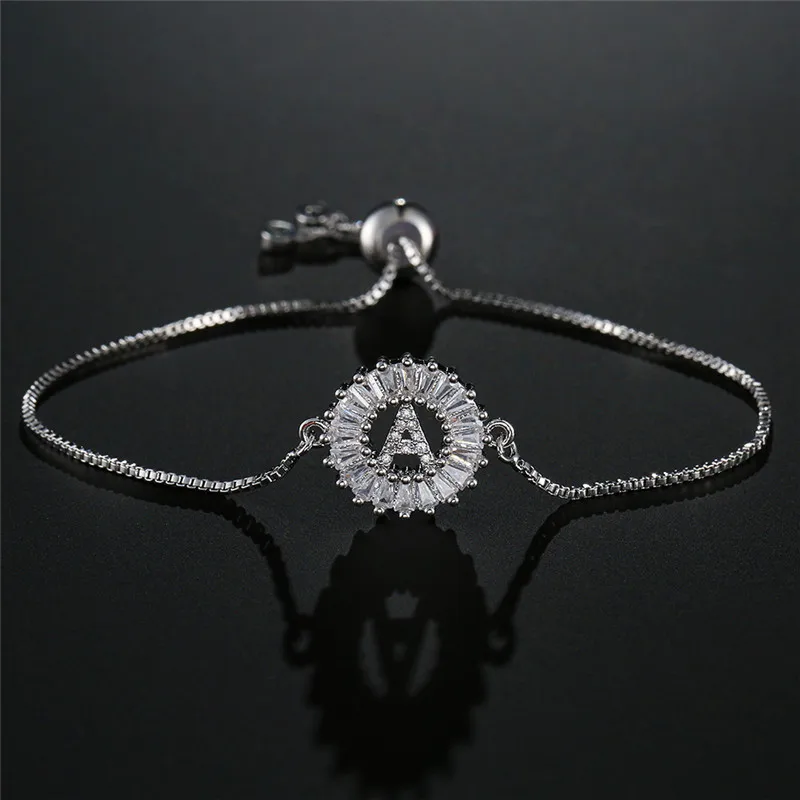 NEWBUY 2018 Trendy Silver Color Letter Charm Bracelets Adjustable Copper Chain Clear Cubic Zirconia Micro Pave 26 Letters Design
NEWBUY 2018 Trendy Silver Color Letter Charm Bracelets Adjustable Copper Chain Clear Cubic Zirconia Micro Pave 26 Letters Design