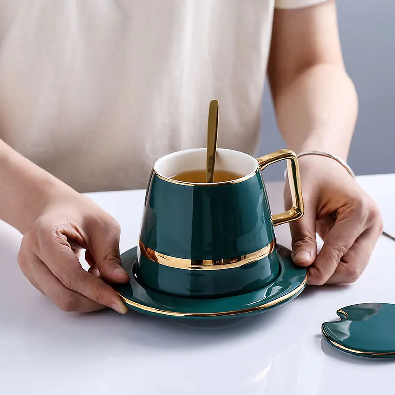 High Quality Gold Rim Ceramic Coffee Cup Ceramic Tea Cup Saucer Spoon Set Advanced Creative Porcelain espresso Cup With Gift box
High Quality Gold Rim Ceramic Coffee Cup Ceramic Tea Cup Saucer Spoon Set Advanced Creative Porcelain espresso Cup With Gift box