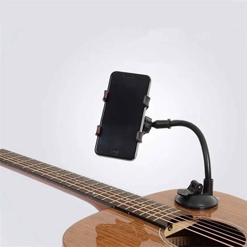 Guitar phone holder Universal Suction-cup Guitar Phone Holder Phones Stand 360 Degree Rotation View Anti-shock anti-slip pad
Guitar phone holder Universal Suction-cup Guitar Phone Holder Phones Stand 360 Degree Rotation View Anti-shock anti-slip pad