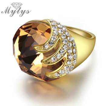 Mytys Champagne luxury ring spiral shape pave Setting Crystal Yellow Gold GP cocktail rings for women R410
Mytys Champagne luxury ring spiral shape pave Setting Crystal Yellow Gold GP cocktail rings for women R410