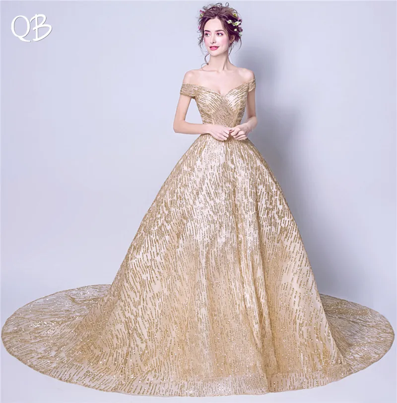 Champagne Ball Gown Big Train Cap Sleeve Sequins Tulle Luxury Evening Dresses 2020 New Fashion Bride Party Prom Dress XK127
Champagne Ball Gown Big Train Cap Sleeve Sequins Tulle Luxury Evening Dresses 2020 New Fashion Bride Party Prom Dress XK127