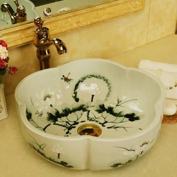 China Artistic Handmade Ceramic wash basin flower shape Counter top countertop blue porcelain Ceramic wash basin bathroom sink
China Artistic Handmade Ceramic wash basin flower shape Counter top countertop blue porcelain Ceramic wash basin bathroom sink