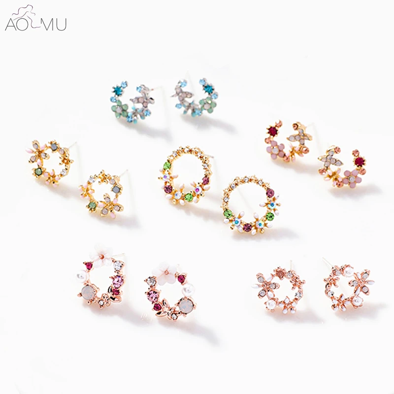 AOMU S925 Sterling Silver Pin Korean Colorful Crystal Wreath Flower Shell Small Cirlce Stud Earrings For Women Girl Brincos Gift
AOMU S925 Sterling Silver Pin Korean Colorful Crystal Wreath Flower Shell Small Cirlce Stud Earrings For Women Girl Brincos Gift