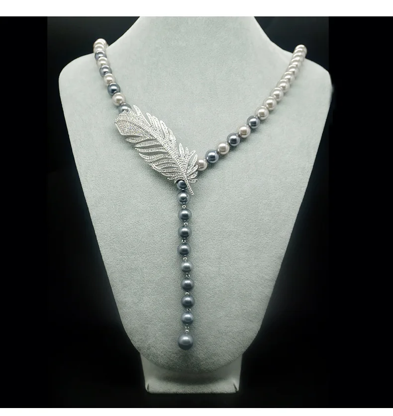 Feather pearl necklace luxury high-end custom-made 100% hand-knitted beaded pearl sweater chain New Year gift
Feather pearl necklace luxury high-end custom-made 100% hand-knitted beaded pearl sweater chain New Year gift