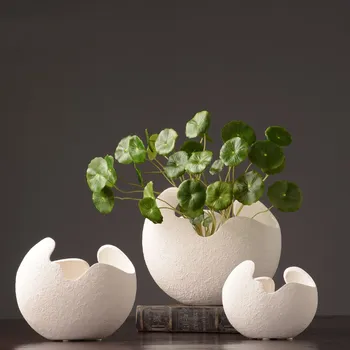 White ceramic eggshell vase simple creative flower fashion home decoration vase living room TV cabinet decoration vase
White ceramic eggshell vase simple creative flower fashion home decoration vase living room TV cabinet decoration vase