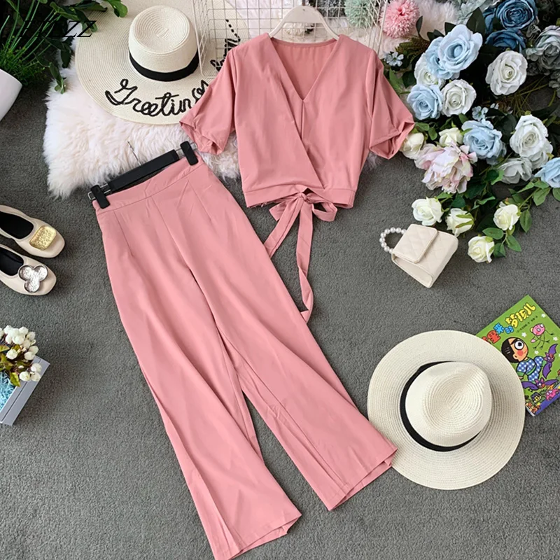 FTLZZ Spring Summer 2019 Pure-colored Short-sleeved V-collar Tops+ High Waist Broad-legged Trousers Women's Two-piece Sets
FTLZZ Spring Summer 2019 Pure-colored Short-sleeved V-collar Tops+ High Waist Broad-legged Trousers Women's Two-piece Sets