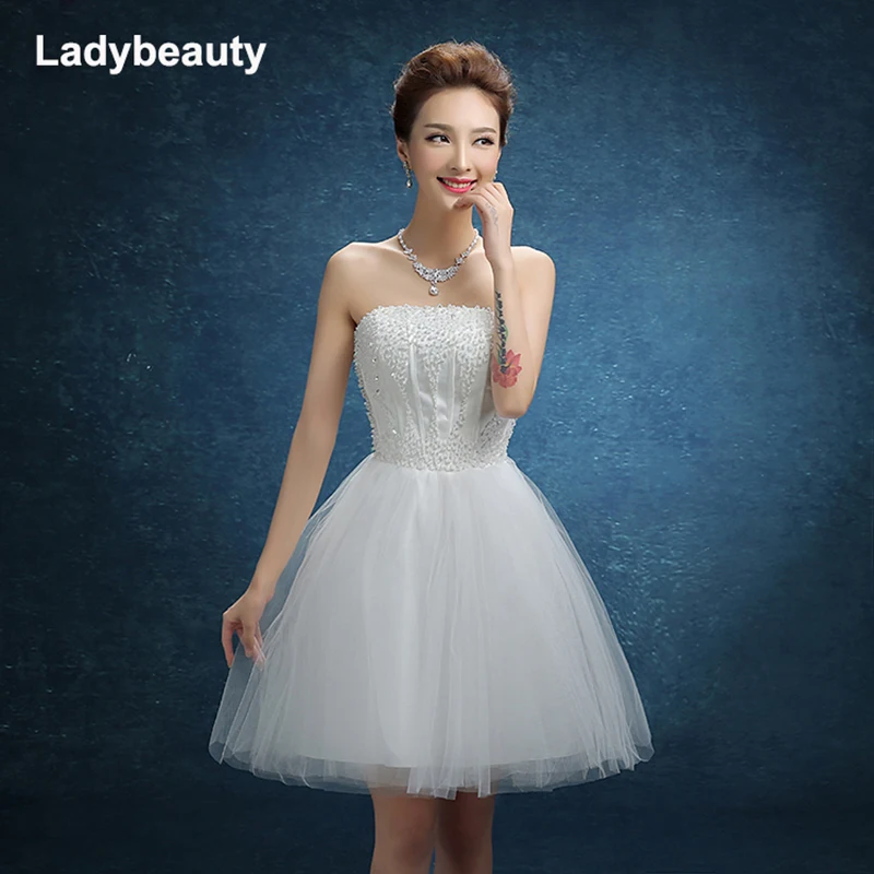 Новинка 2018, белое короткое свадебное платье Ladybeauty, свадебное платье для невесты с бисером, свадебное платье без бретелек со шнуровкой
Новинка 2018, белое короткое свадебное платье Ladybeauty, свадебное платье для невесты с бисером, свадебное платье без бретелек со шнуровкой
