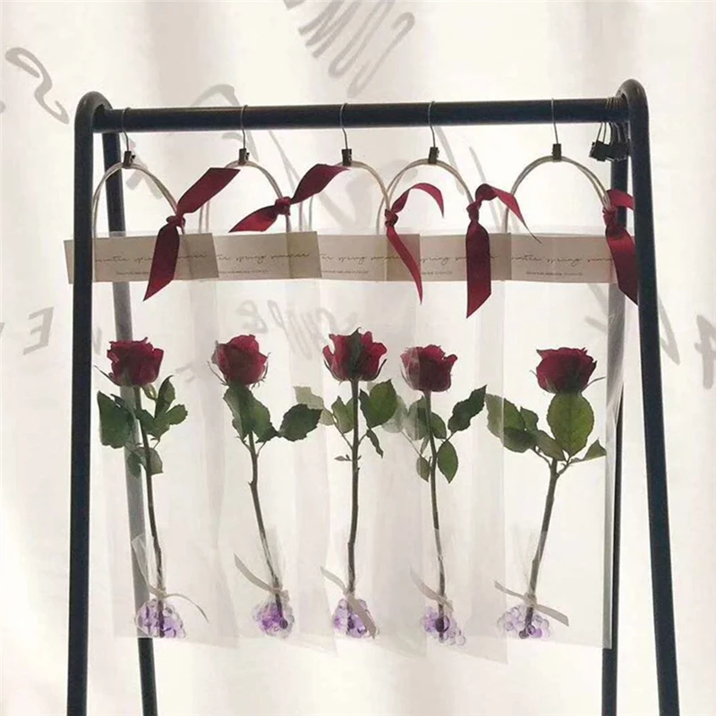 10pcs/lot Rose Flower Tote Bag Transparent Flower Gift Bags Wedding Party Decoration Can Hang Hard Girlfriend Flower Gift Boxes
10pcs/lot Rose Flower Tote Bag Transparent Flower Gift Bags Wedding Party Decoration Can Hang Hard Girlfriend Flower Gift Boxes