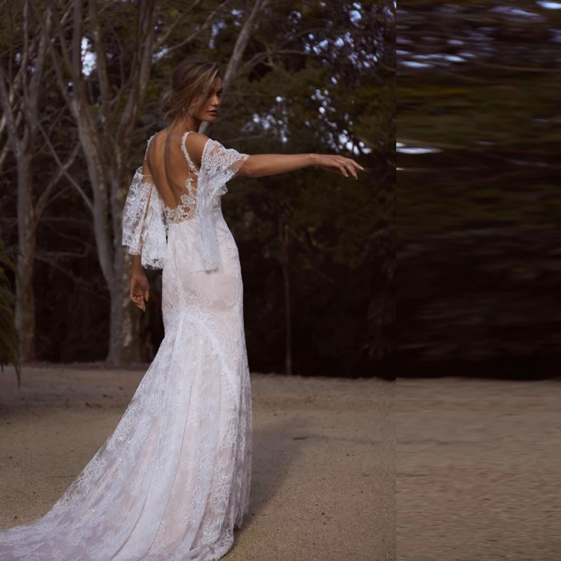 Champagne Beach Mermaid Wedding Dress 2019 Lace Appliques Bride Dress Sexy V Neck Floor Length Boho Bridal Gown
Champagne Beach Mermaid Wedding Dress 2019 Lace Appliques Bride Dress Sexy V Neck Floor Length Boho Bridal Gown