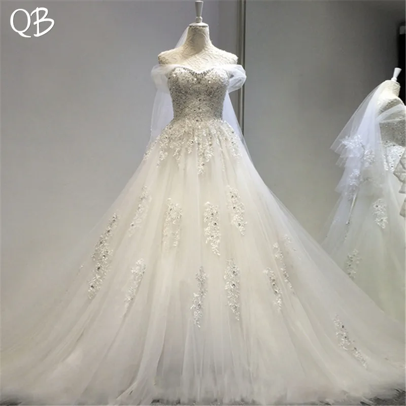 Luxury Ball Gown Sweetheart Fluffy Tulle Lace Beading Crystal Real Wedding Dress 2019 New Bridal Dresses Wedding Gowns WE07
Luxury Ball Gown Sweetheart Fluffy Tulle Lace Beading Crystal Real Wedding Dress 2019 New Bridal Dresses Wedding Gowns WE07