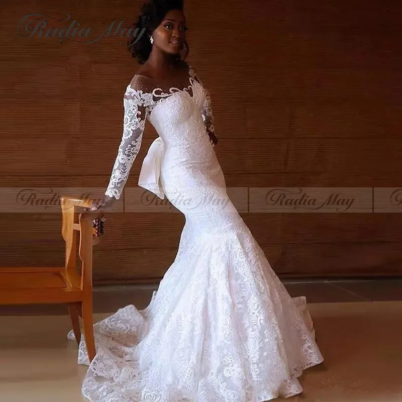New Arrival 2019 White Lace Mermaid African Wedding Gowns Long Sleeves Illusion Beaded Plus Size Nigeria Wedding Dress with Bow
New Arrival 2019 White Lace Mermaid African Wedding Gowns Long Sleeves Illusion Beaded Plus Size Nigeria Wedding Dress with Bow