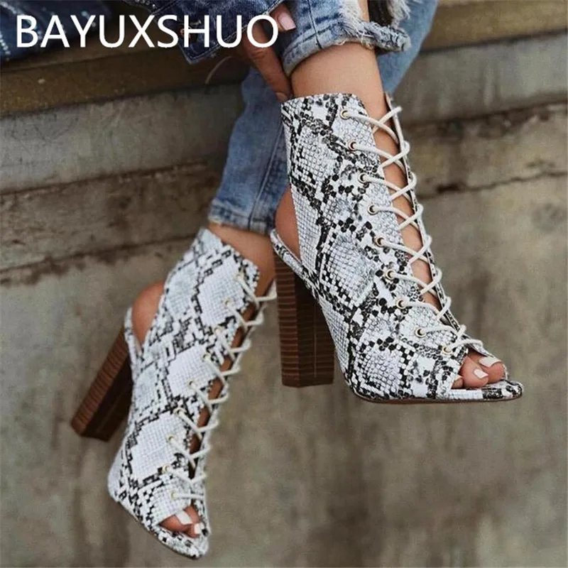 BAYUXSHUO Summer Ladies High Heel Boots Serpentine Pattern Square Heels Fashion Open Toe Buckle Sandals Casual Sexy Women Shoes
BAYUXSHUO Summer Ladies High Heel Boots Serpentine Pattern Square Heels Fashion Open Toe Buckle Sandals Casual Sexy Women Shoes
