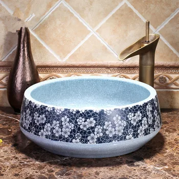 Chinese Handmade round Shape Modern Artistic White Vessel Sink Ceramic Bathroom Sink ceramic sink for bathroom
Chinese Handmade round Shape Modern Artistic White Vessel Sink Ceramic Bathroom Sink ceramic sink for bathroom