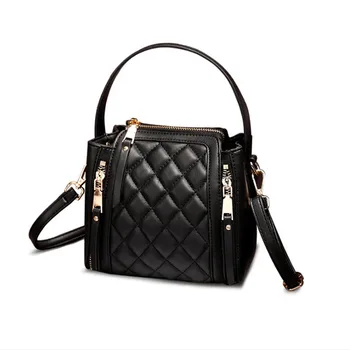 rhombus bag female new wave Korean version of the Oblique span portable bucket bag leather small black bag 
rhombus bag female new wave Korean version of the Oblique span portable bucket bag leather small black bag