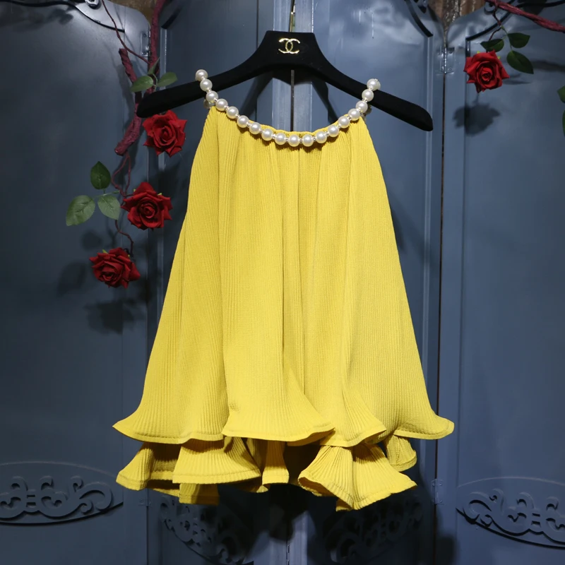 2019 Summer Lady Shirt Sleeveless Halter beading women chiffon ruffles blouse Female Fashion Blouses Shirt
2019 Summer Lady Shirt Sleeveless Halter beading women chiffon ruffles blouse Female Fashion Blouses Shirt