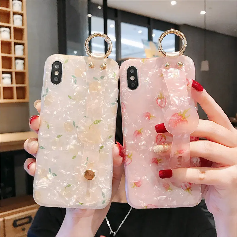 Pink shell conch Wrist Strap phone case for iphone7 7plus xs max Strawberry wristband holder cover for iphone 7 8 6 6s plus x xr
Pink shell conch Wrist Strap phone case for iphone7 7plus xs max Strawberry wristband holder cover for iphone 7 8 6 6s plus x xr