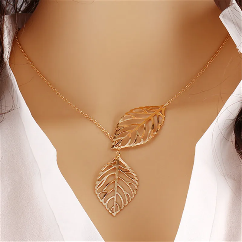 Fashion Necklace double Leaves Pendants Gold Necklace Clavicle Gold Chain for Woman Girls Clothing Jewelry Accessories Gift
Fashion Necklace double Leaves Pendants Gold Necklace Clavicle Gold Chain for Woman Girls Clothing Jewelry Accessories Gift