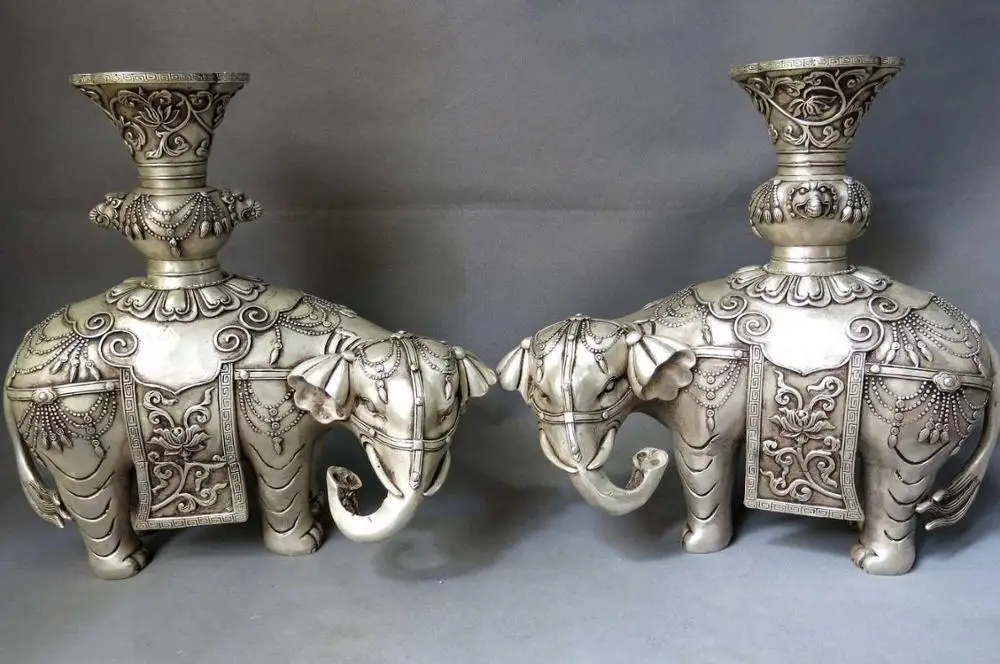 12" China silver buddhism lucky eight treasure vases sculpture Elephants Statue
12" China silver buddhism lucky eight treasure vases sculpture Elephants Statue