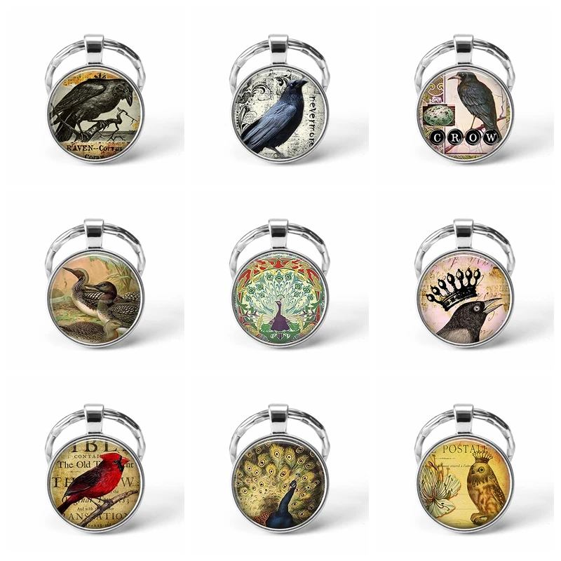 Bird Keychain Crow Robin Hummingbird Glass Cabochon Pendant Bird Jewelry Silver Plated Metal Key Chain Birthday Gift for Friends
Bird Keychain Crow Robin Hummingbird Glass Cabochon Pendant Bird Jewelry Silver Plated Metal Key Chain Birthday Gift for Friends