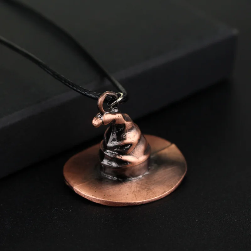Vintage HARRY Hogwarts School Sorting Hat Necklace with leather for movie fans magic steeple wizard hat potter pendant for gifts
Vintage HARRY Hogwarts School Sorting Hat Necklace with leather for movie fans magic steeple wizard hat potter pendant for gifts
