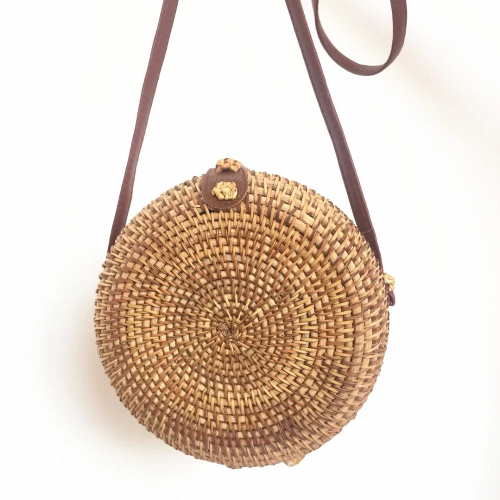 Hand-woven rattan leather buckle straw bag women's shoulder bag round woven bag Bohemian beach bag ins with same paragraph Bali
Hand-woven rattan leather buckle straw bag women's shoulder bag round woven bag Bohemian beach bag ins with same paragraph Bali