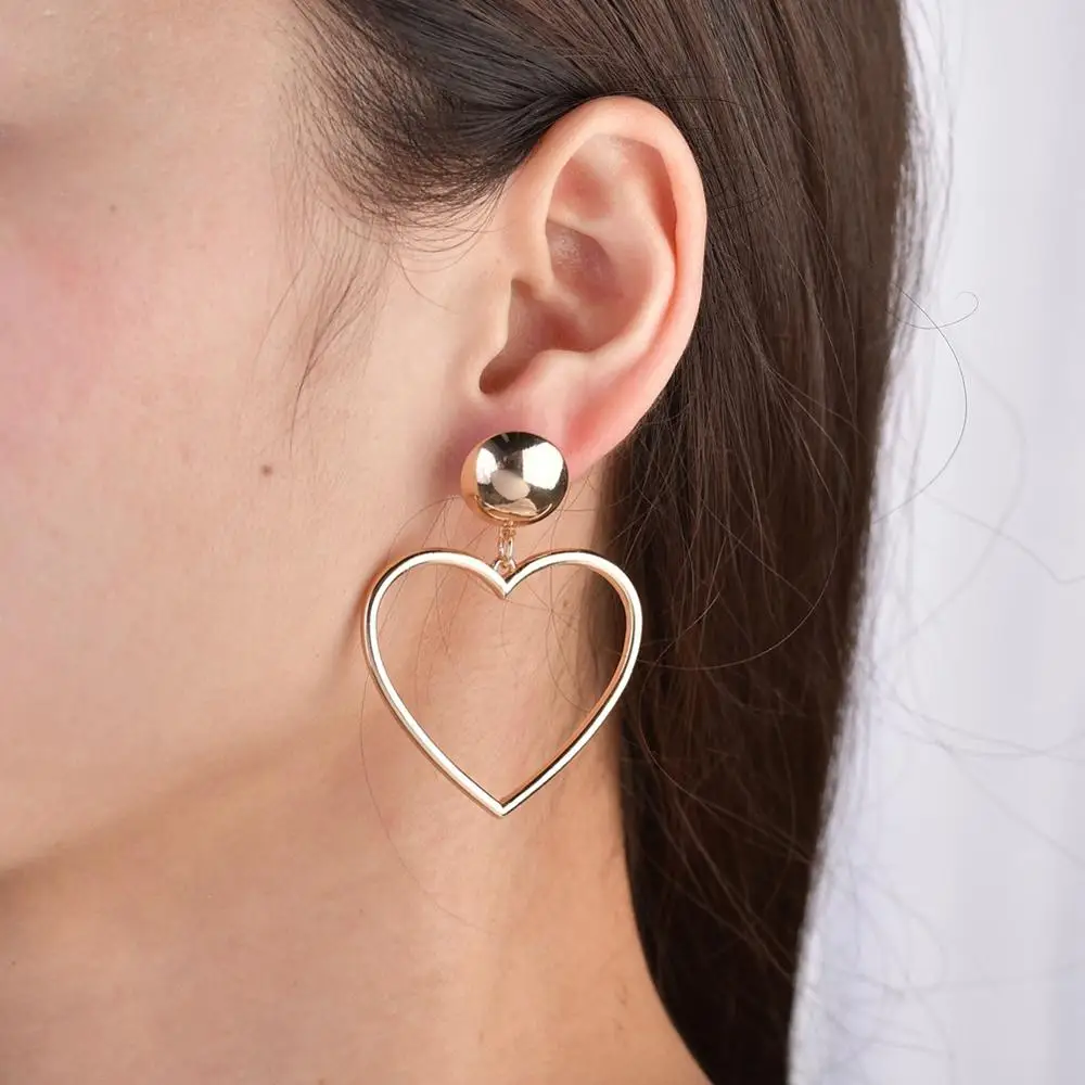 2019 personality simple peach heart earrings fashion creative silver alloy earrings cute sweet wind yellow exaggeration
2019 personality simple peach heart earrings fashion creative silver alloy earrings cute sweet wind yellow exaggeration