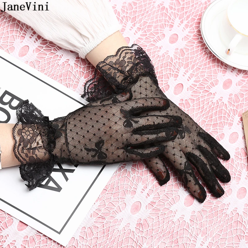 Фото Женские короткие свадебные перчатки JaneVini черные/белые длиной до запястья