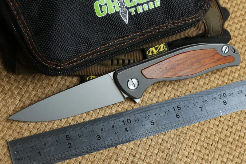 Green thorn F95 Flipper folding knife D2 blade Titanium + Sandalwood handle outdoor survival camping pocket knives EDC tools
Green thorn F95 Flipper folding knife D2 blade Titanium + Sandalwood handle outdoor survival camping pocket knives EDC tools